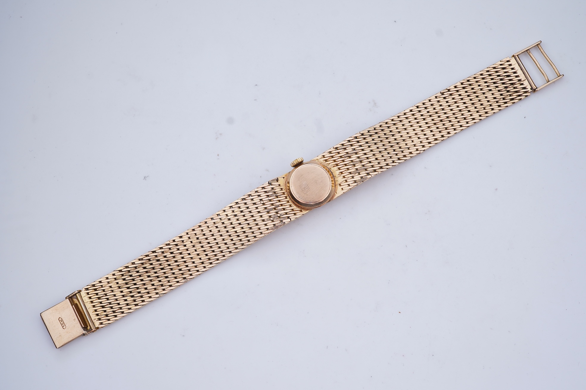 Ermaten, a gold watch